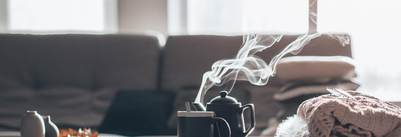 steaming mug on living room table 