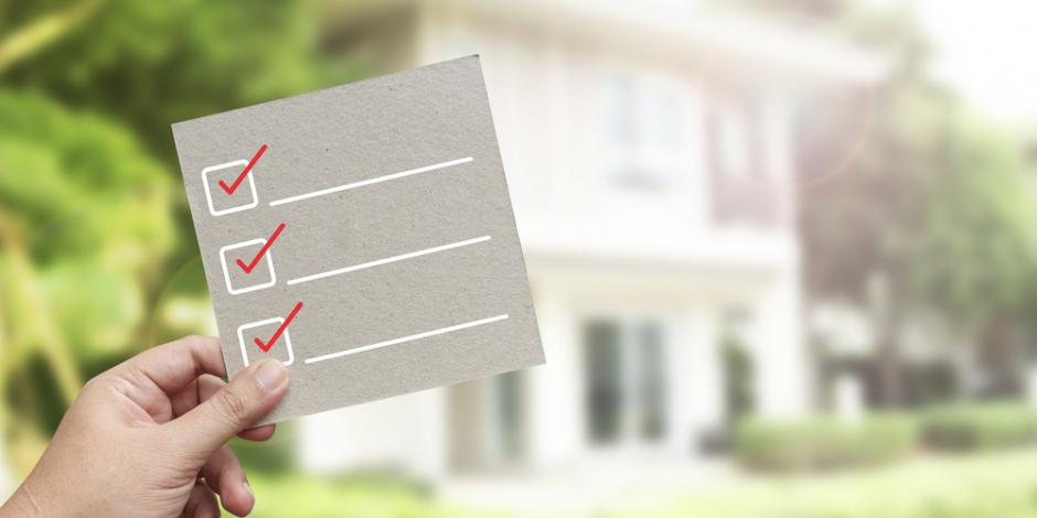 energy audit checklist concept, checklist in front of house exterior energy audit checklist concept, checklist in front of house exterior